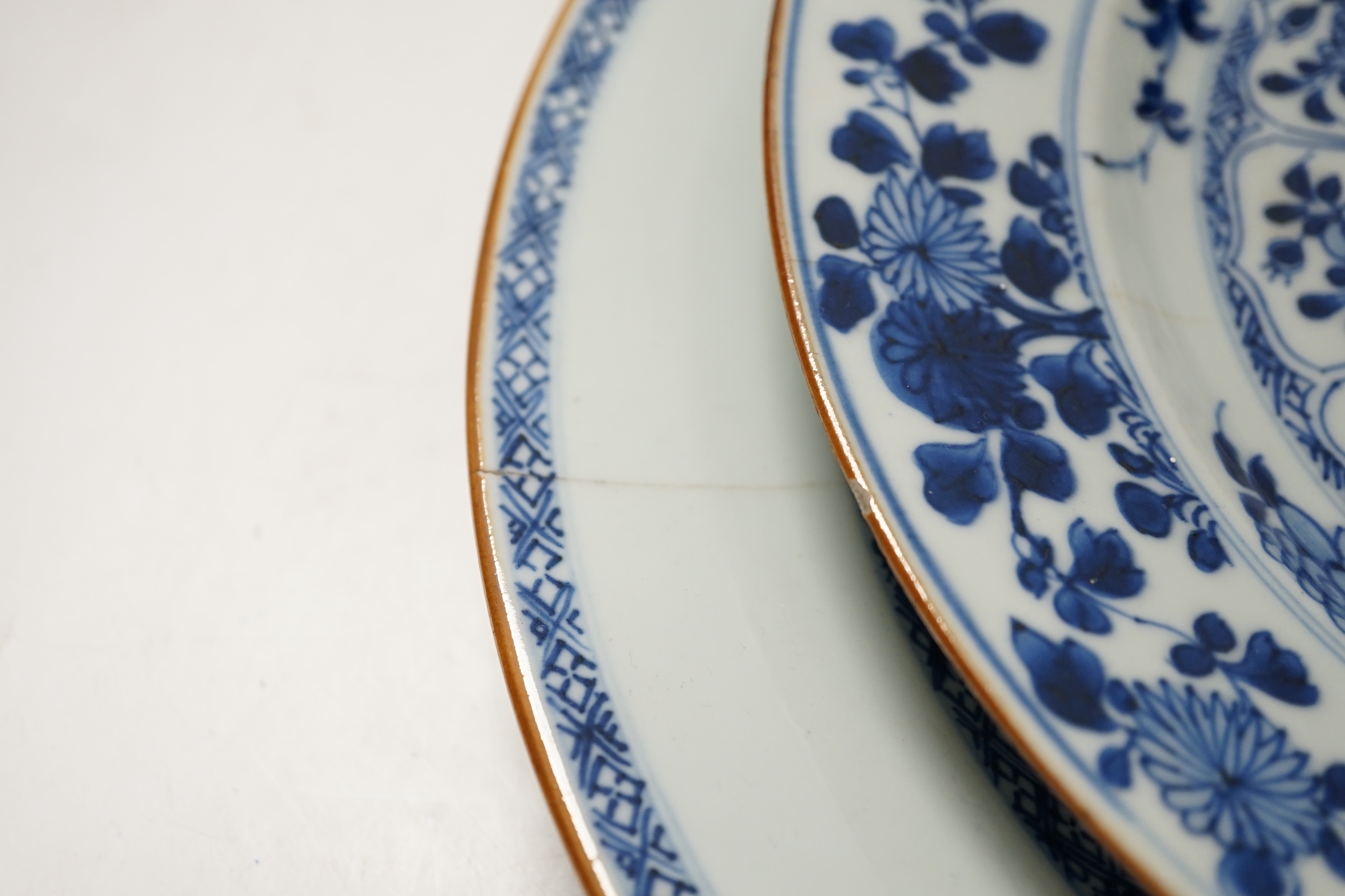 Three Chinese blue and white dishes or plates, Kangxi to Qianlong period and two later covers, largest plate 32cm diameter